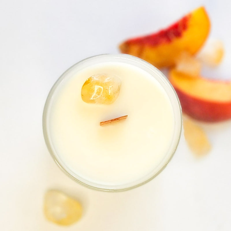 Citrine crystal candle with wooden wick in frosted white vessel - Tangerine and Peach Tea