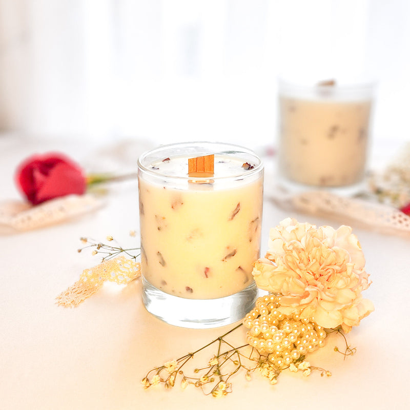 Wooden wick candle with wooden wick and rose petals in clear glass tumbler - Tuberose and Frangipani. 