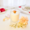 Pink Calcite crystal candle with wooden wick in frosted white vessel - Tuberose and Frangipani floral scent